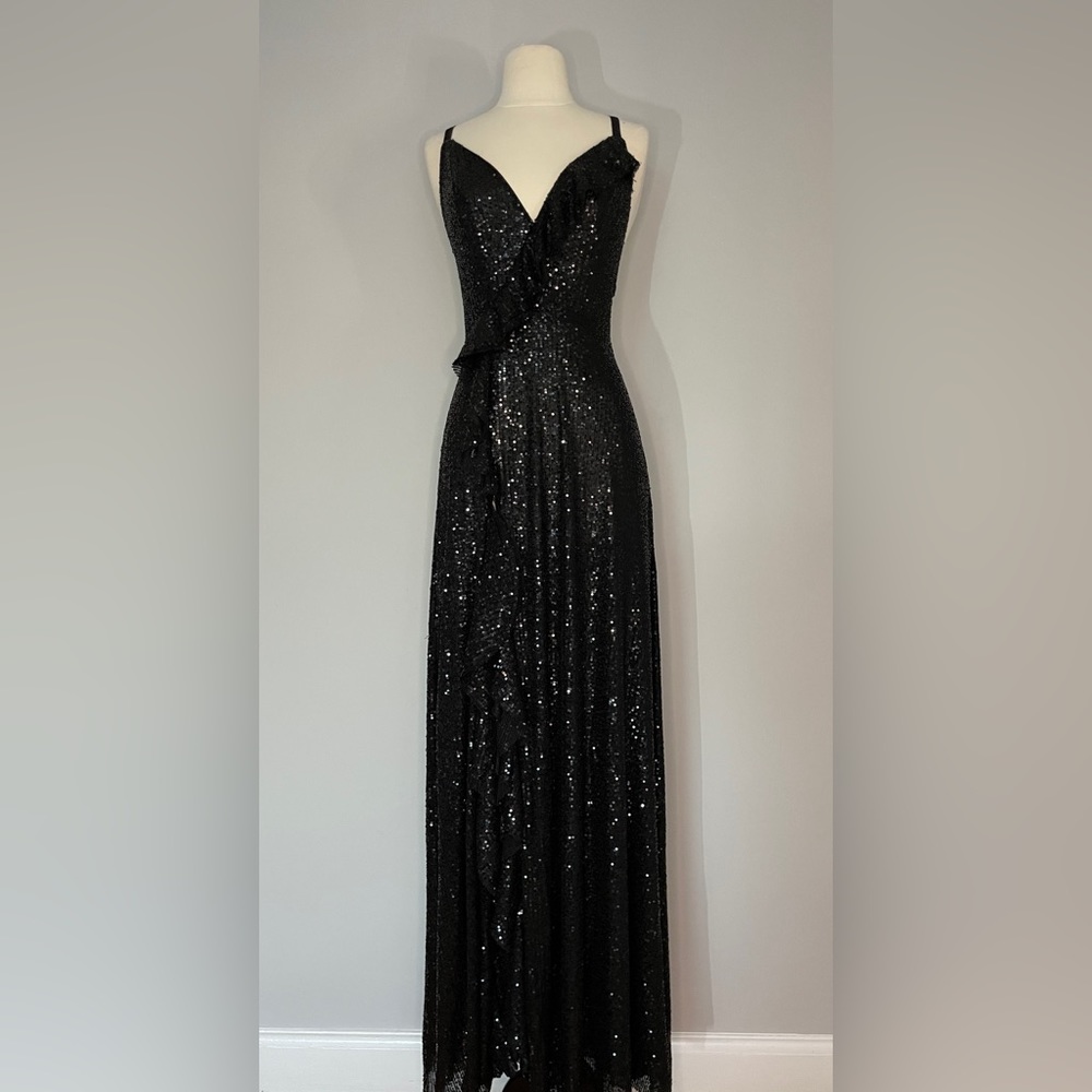 “what’s more exciting” black sequined maxi dress from red dress boutique